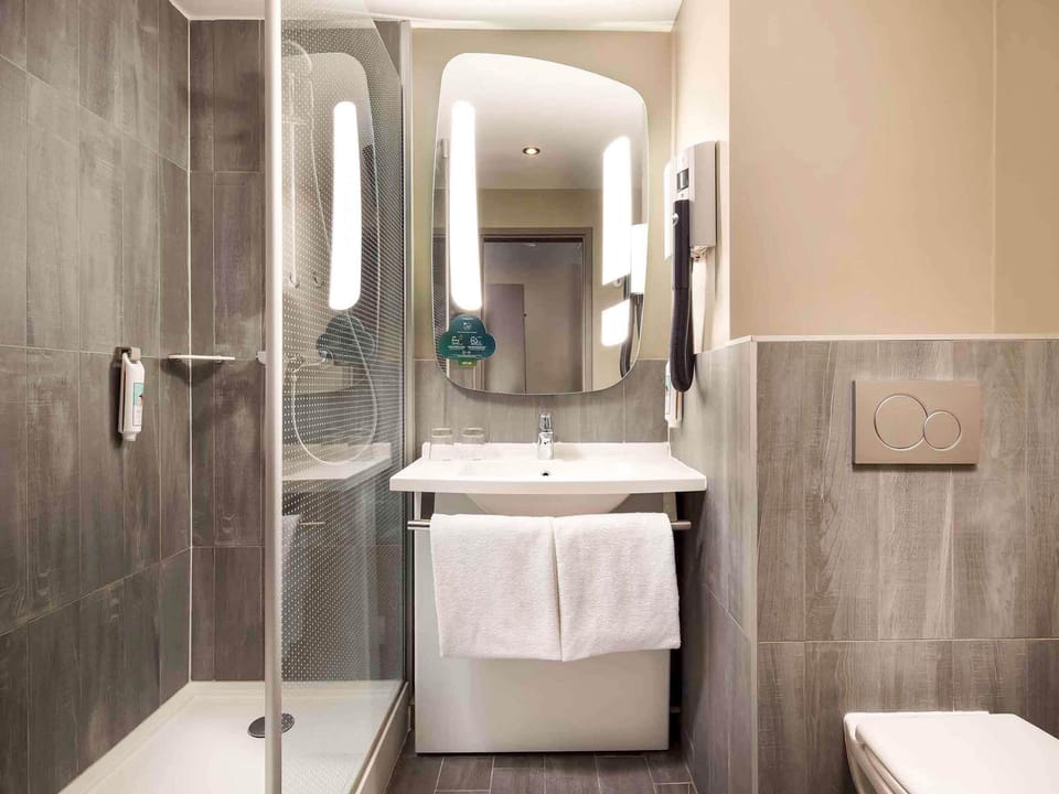 Eco-friendly toiletries, hair dryer, towels, soap