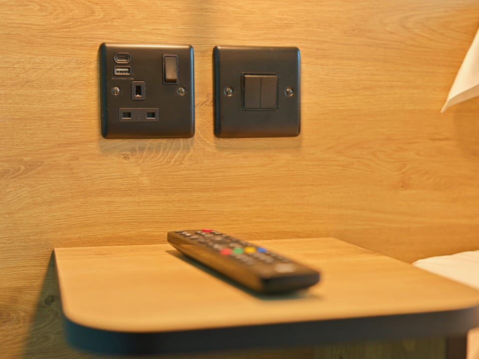 Desk, laptop workspace, blackout drapes, soundproofing