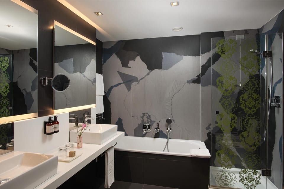 Eco-friendly toiletries, hair dryer, bidet, towels