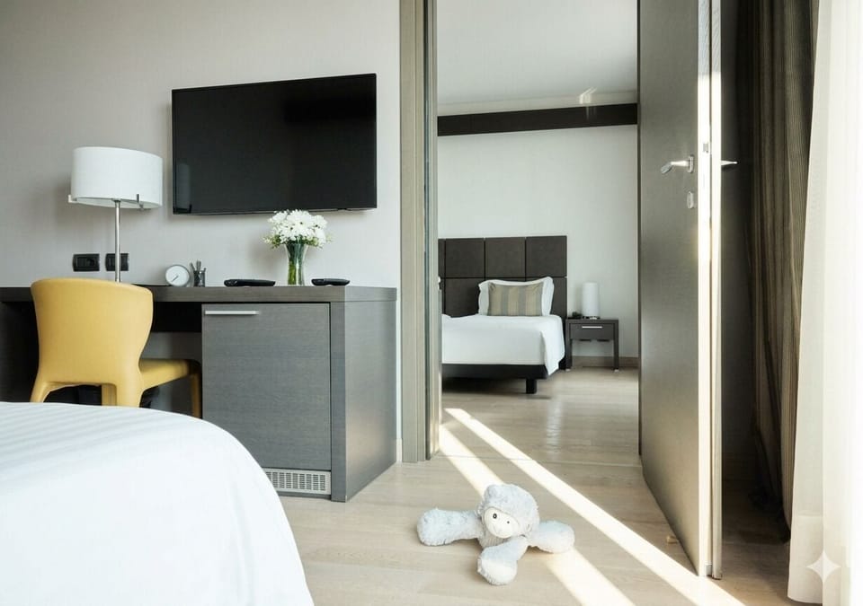 Family Room, Multiple Beds (Deluxe) | Hypo-allergenic bedding, minibar, in-room safe, desk