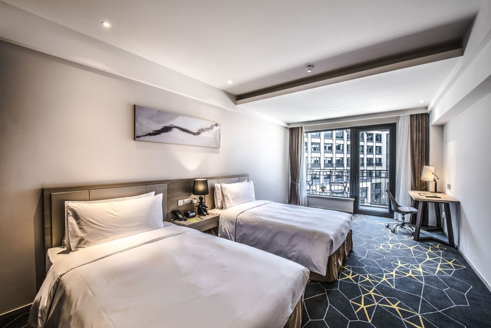 Superior Twin | 1 bedroom, desk, blackout drapes, soundproofing