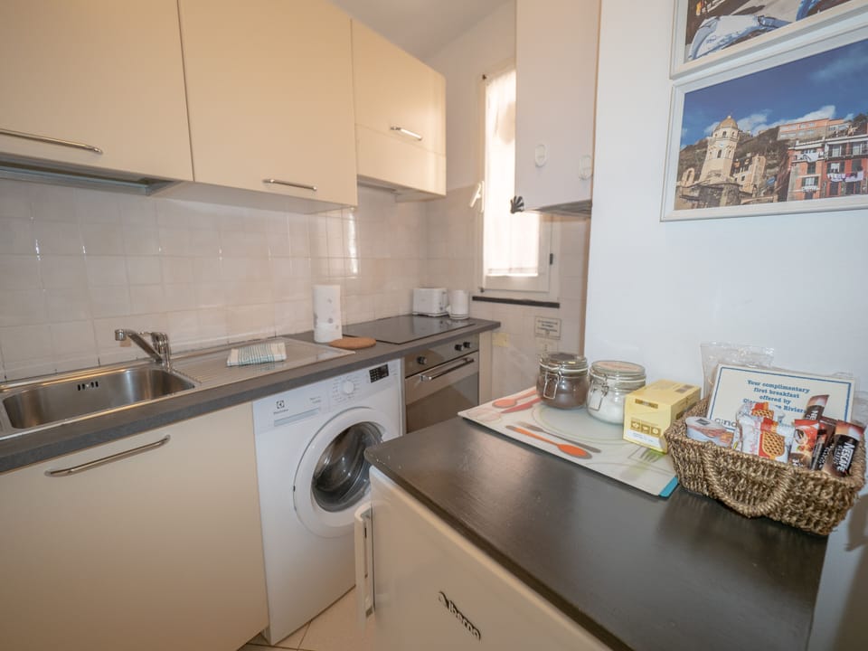 Apartment, 2 Bedrooms, Balcony | Private kitchen | Full-size fridge, microwave, oven, stovetop