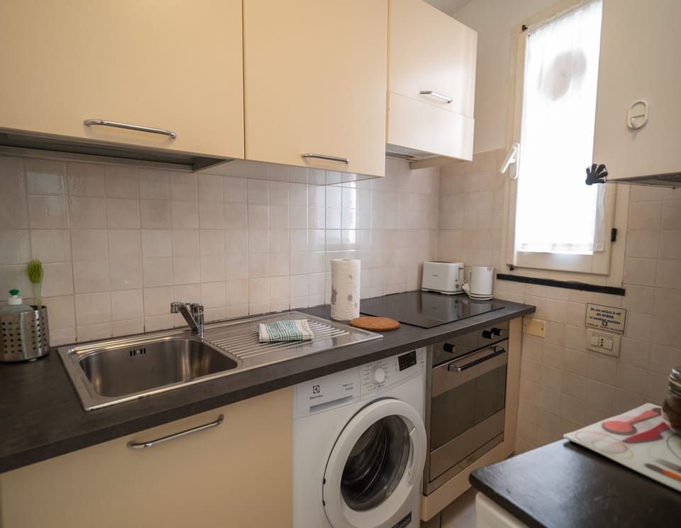 Apartment, 2 Bedrooms, Balcony | Private kitchen | Full-size fridge, microwave, oven, stovetop