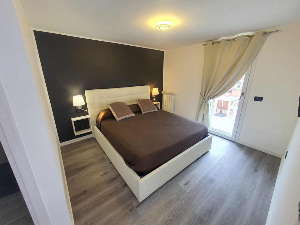 Deluxe Double Room | Blackout drapes, iron/ironing board, free WiFi, bed sheets