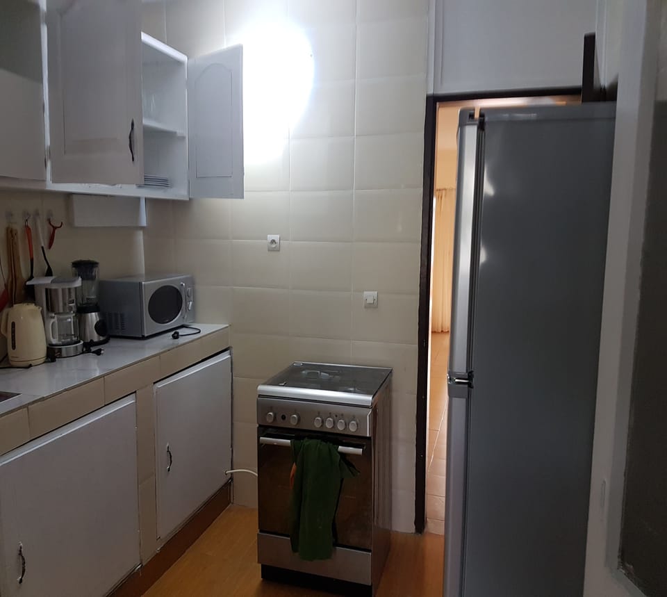 Classic Apartment, 2 Bedrooms | Private kitchen | Coffee/tea maker, full-size fridge, microwave, oven