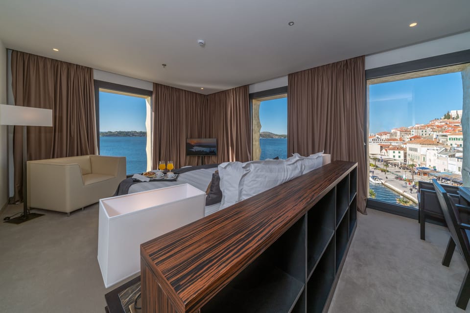 Deluxe Double Room, Sea View | Hypo-allergenic bedding, minibar, in-room safe, desk