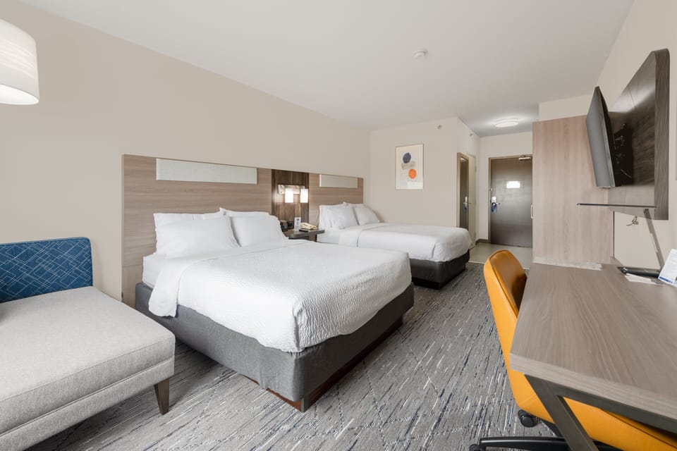 Standard Room, 2 Queen Beds | In-room safe, desk, iron/ironing board, free cribs/infant beds