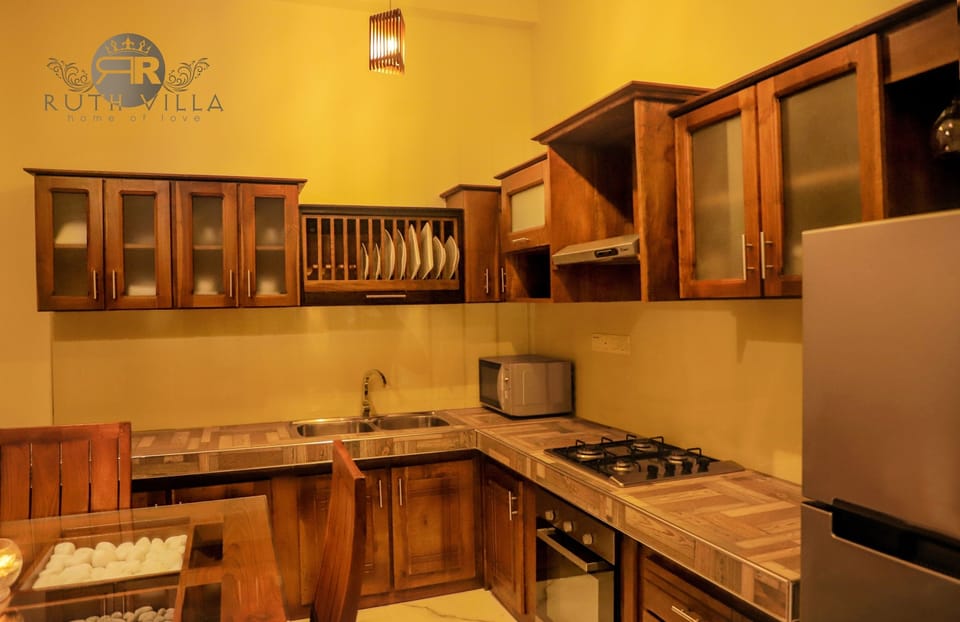 Deluxe Apartment, 1 Bedroom, Garden View | Private kitchen | Shared fridge, microwave, coffee/tea maker, electric kettle