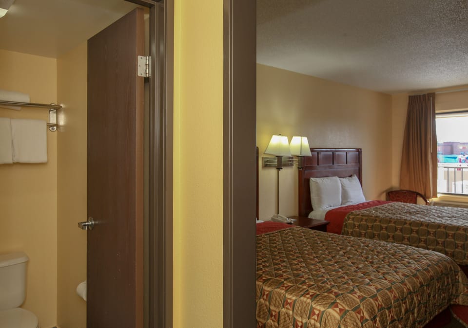 Standard Room, 2 Queen Beds | Free WiFi, bed sheets