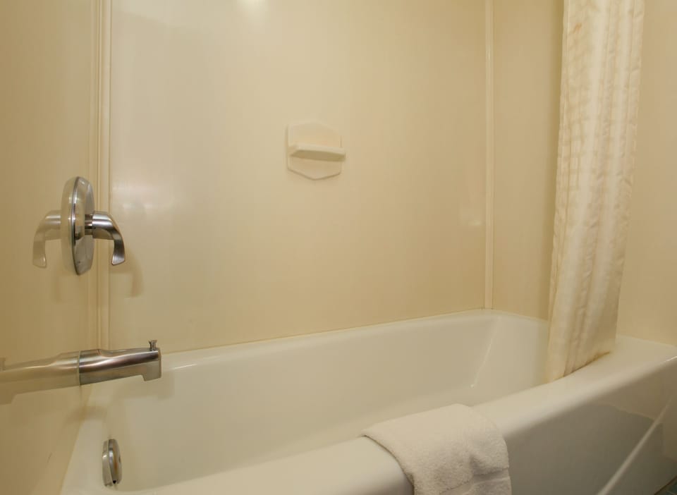 Standard Room, 2 Queen Beds | Bathroom | Combined shower/tub, free toiletries, hair dryer, towels