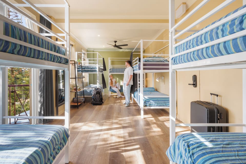 Bed in 10-Bed Mixed Dorm with Balcony, Shared Bathroom | Iron/ironing board, bed sheets