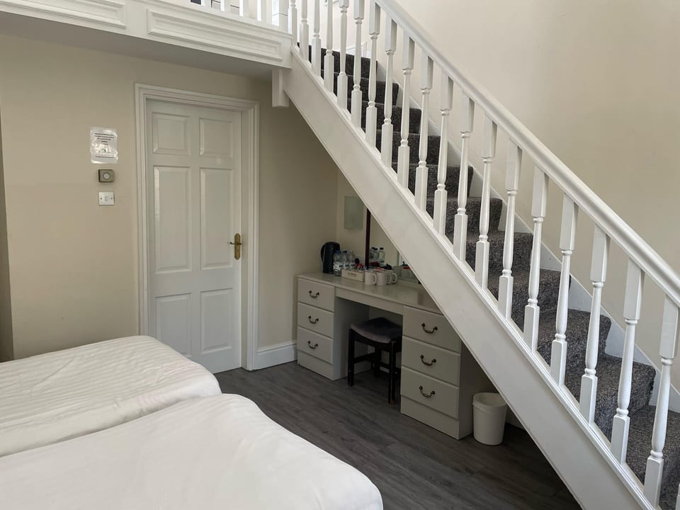 Family Room, Multiple Beds | Desk, iron/ironing board, free WiFi, bed sheets