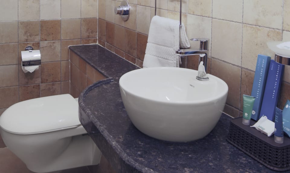 Standard Room | Bathroom | Shower, free toiletries, towels, soap