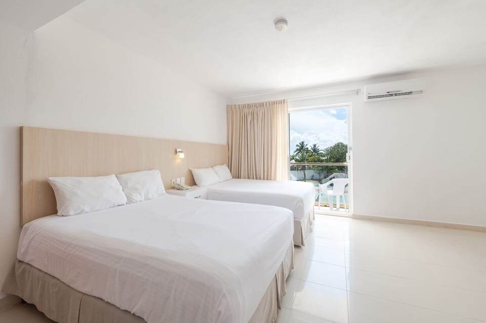 Standard Room, 1 Bedroom | In-room safe, individually decorated, desk, blackout drapes