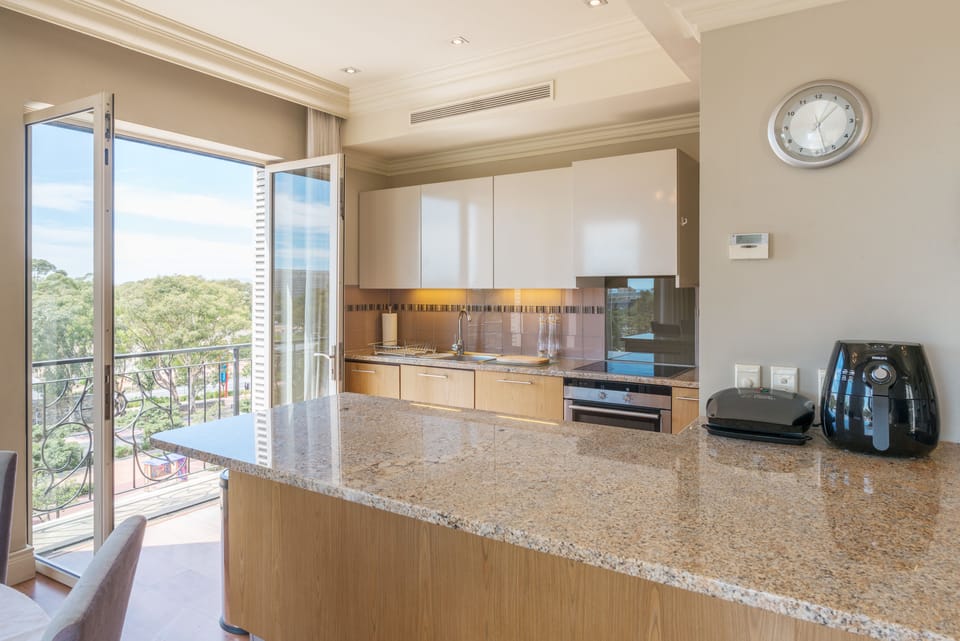 Luxury Suite, 2 Bedrooms, Kitchen, Ocean View | Private kitchen | Full-size fridge, microwave, oven, stovetop