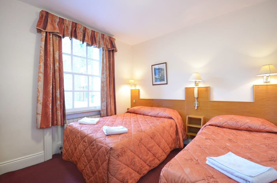 Triple Room | Premium bedding, in-room safe, desk, iron/ironing board