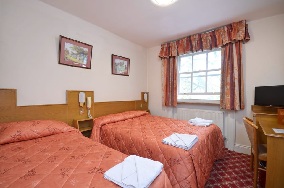 Premium bedding, in-room safe, desk, iron/ironing board