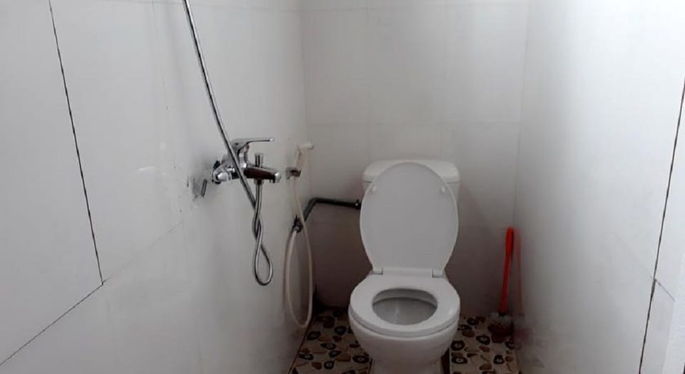 Shower, free toiletries, hair dryer, slippers