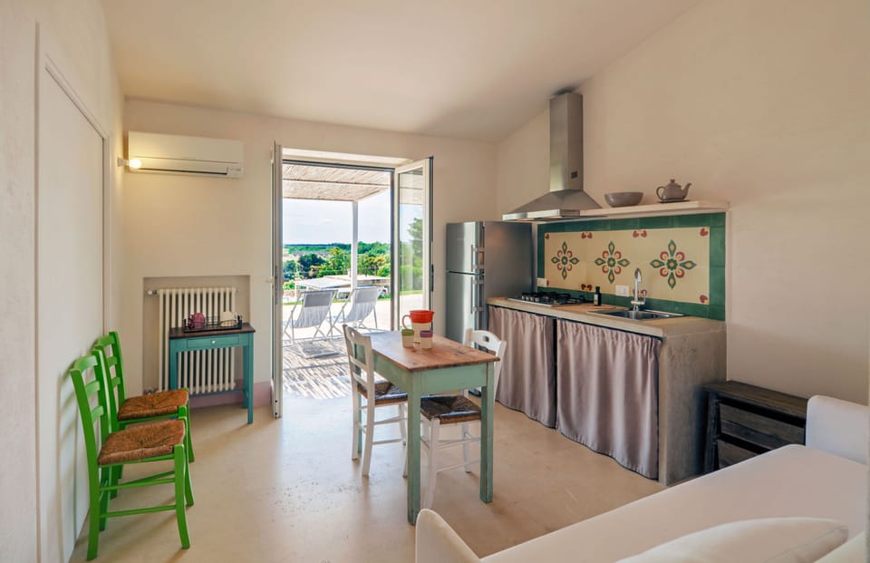 Family Apartment, Lake View | Living area | 22-inch LCD TV with digital channels