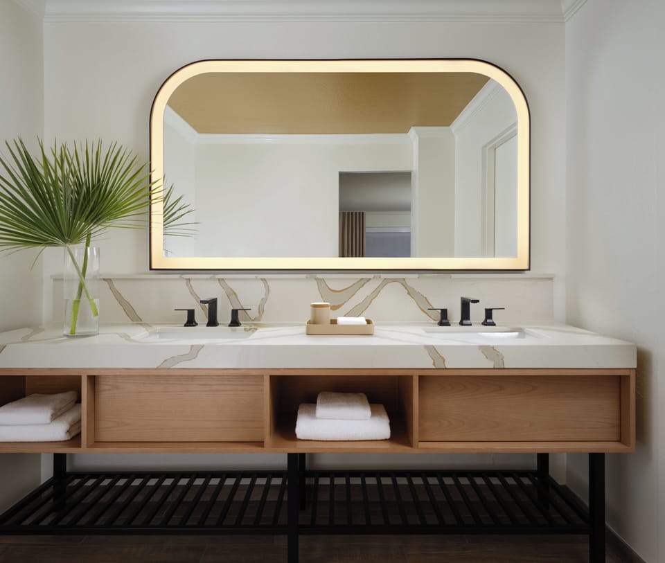 Designer toiletries, hair dryer, bathrobes, towels