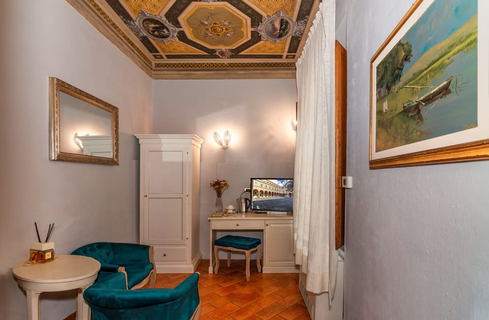 Deluxe Double Room, City View | Living area | Flat-screen TV