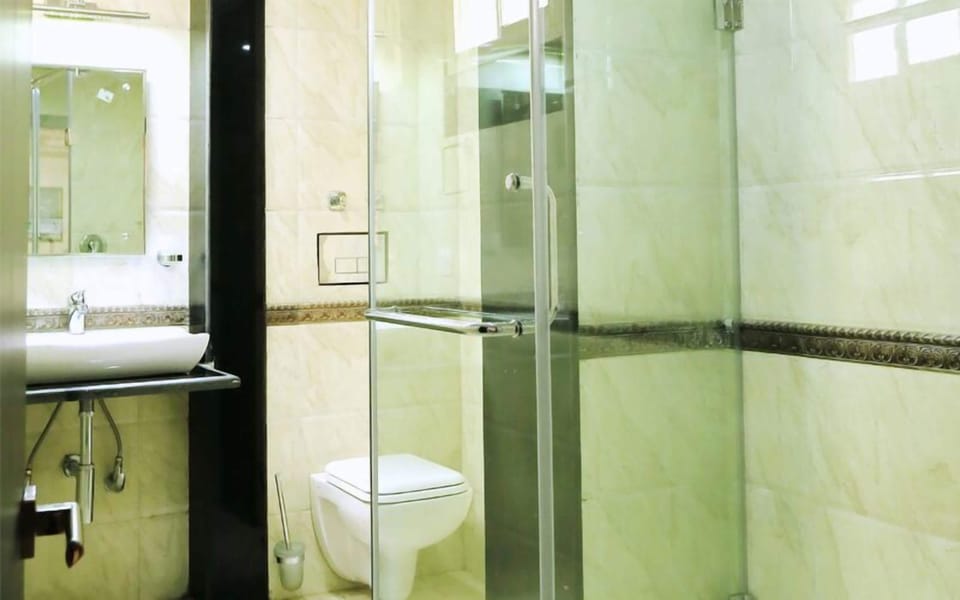 Deluxe Room with AC | Bathroom | Shower, rainfall showerhead, free toiletries, slippers