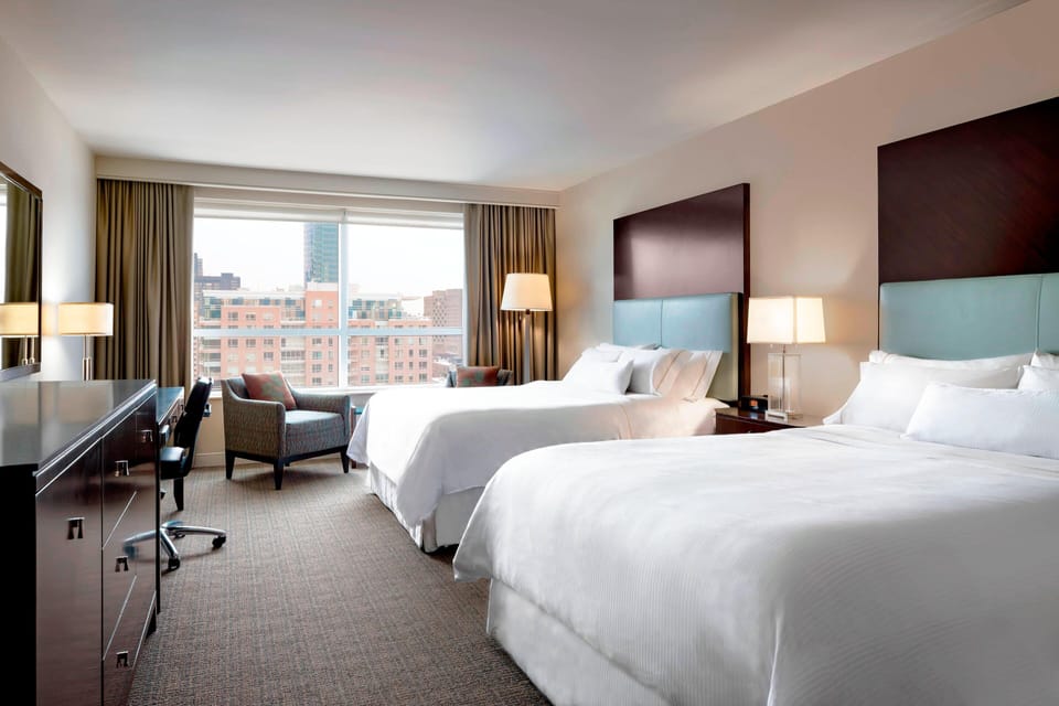 Premium bedding, down comforters, pillowtop beds, in-room safe