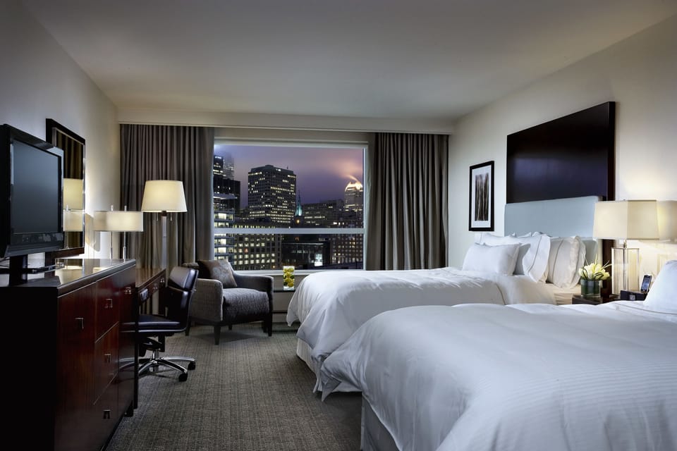 Premium bedding, down comforters, pillowtop beds, in-room safe