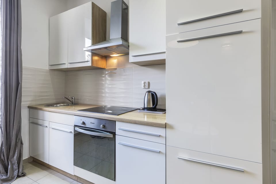 Exclusive Apartment (3) | Living area | Flat-screen TV