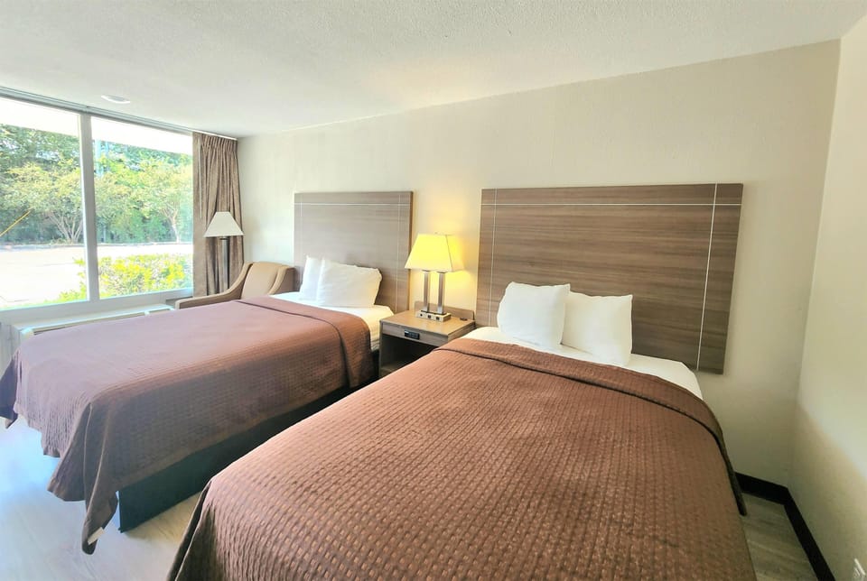 Double Room, 2 Double Beds | Iron/ironing board, free cribs/infant beds, free WiFi, bed sheets