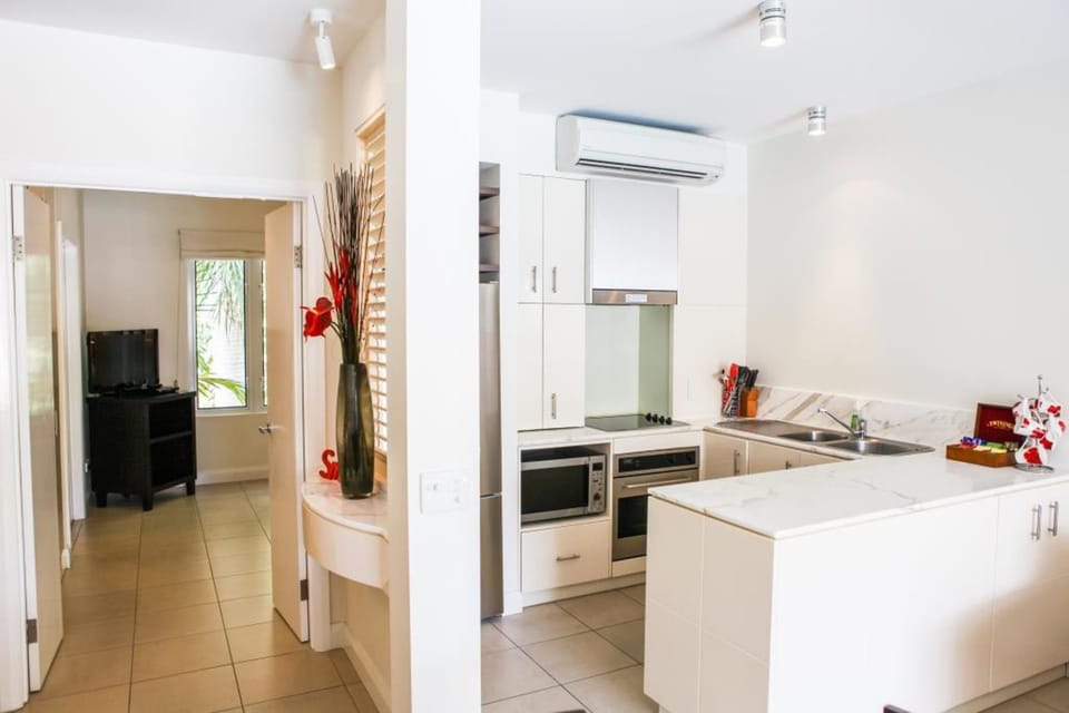 Deluxe Apartment, 2 Bedrooms, Pool View | Private kitchen | Full-size fridge, microwave, oven, stovetop