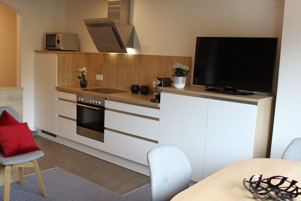 Junior Suite Apartment | Private kitchen | Espresso maker, coffee/tea maker, highchair, blender