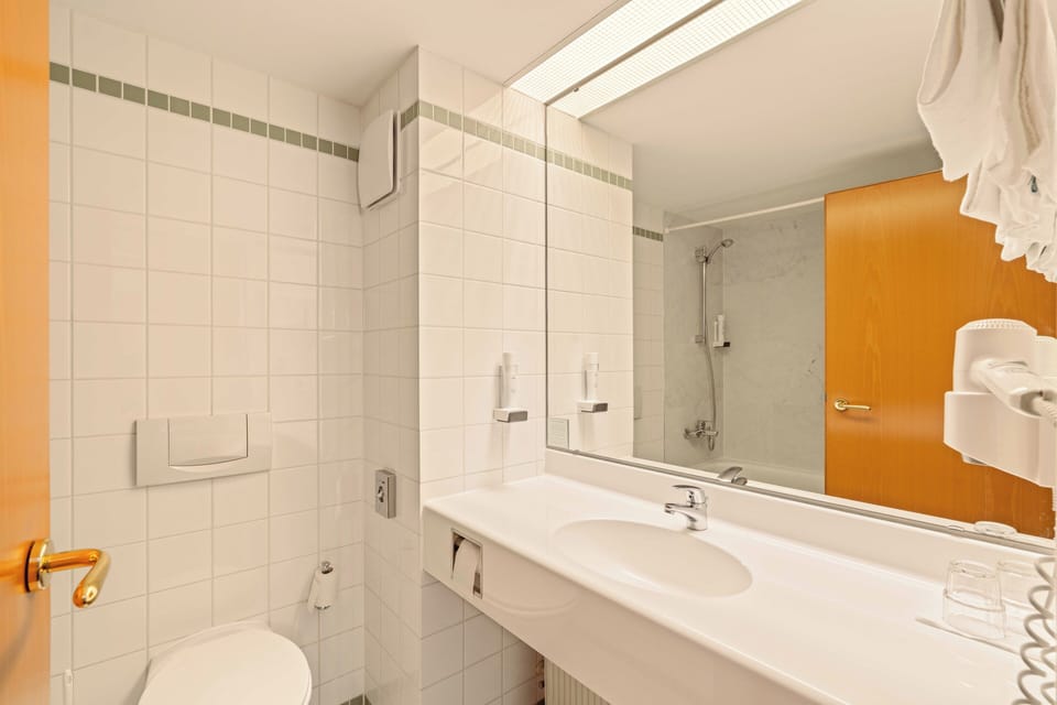 Eco-friendly toiletries, hair dryer, towels, soap