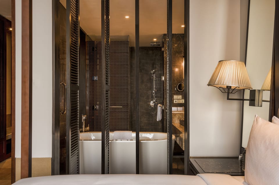 Separate tub and shower, rainfall showerhead, free toiletries
