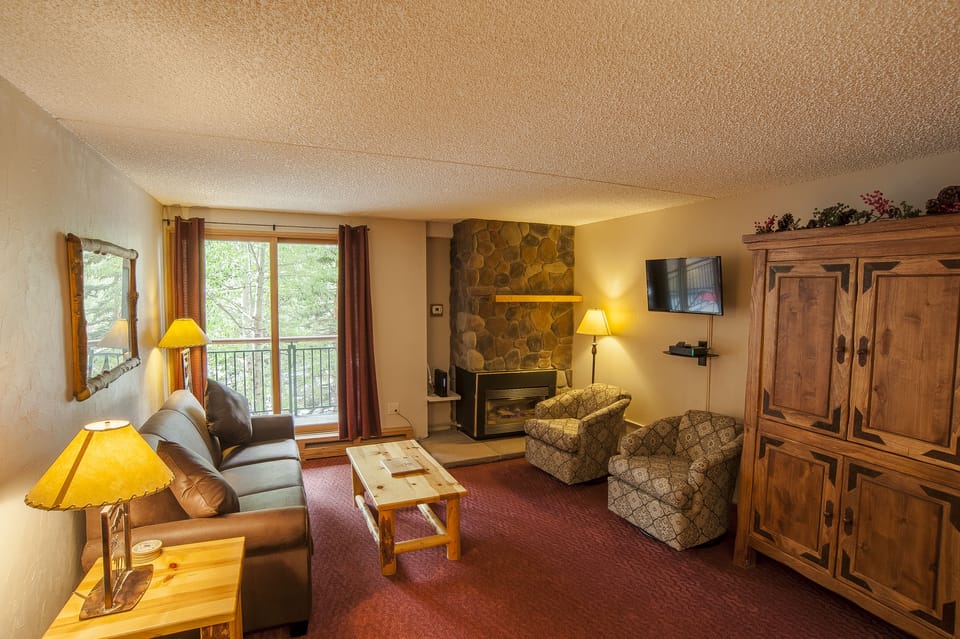 Premium Condo, Fireplace, Mountain View | Living room | Flat-screen TV