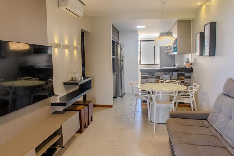 Luxury Apartment | Living area | 50-inch flat-screen TV with satellite channels, TV