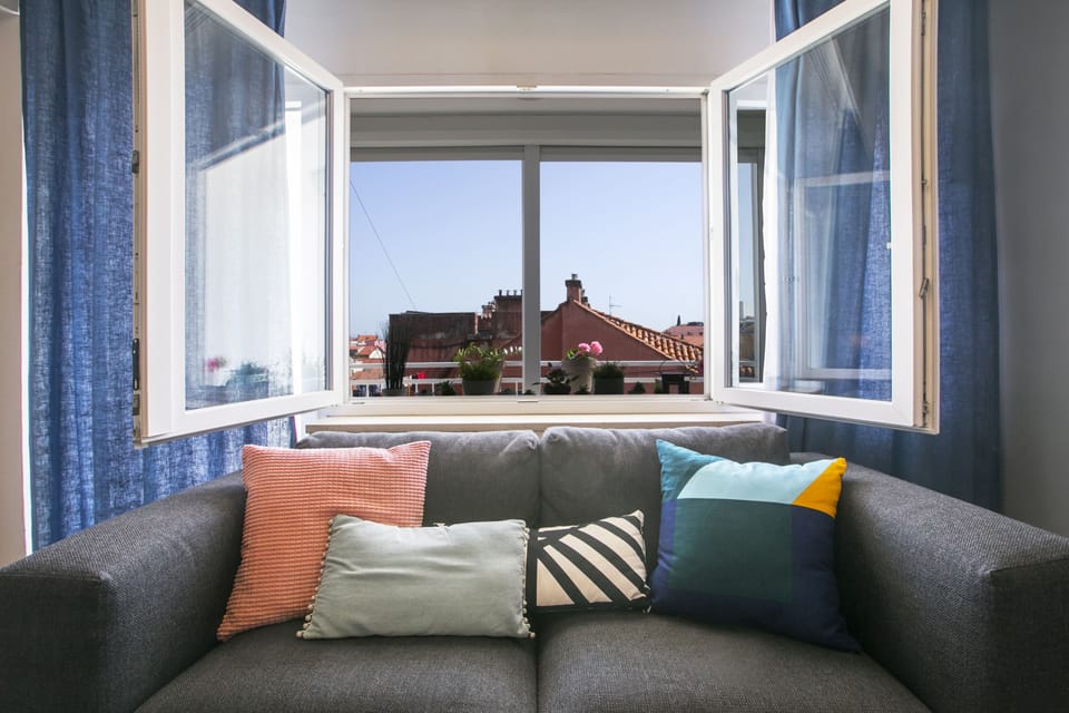 Deluxe Double Room, Balcony | Living room | Flat-screen TV