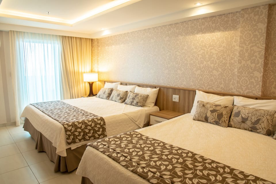 Premier Suite, Non Smoking, Beach View | 1 bedroom, minibar, in-room safe, desk