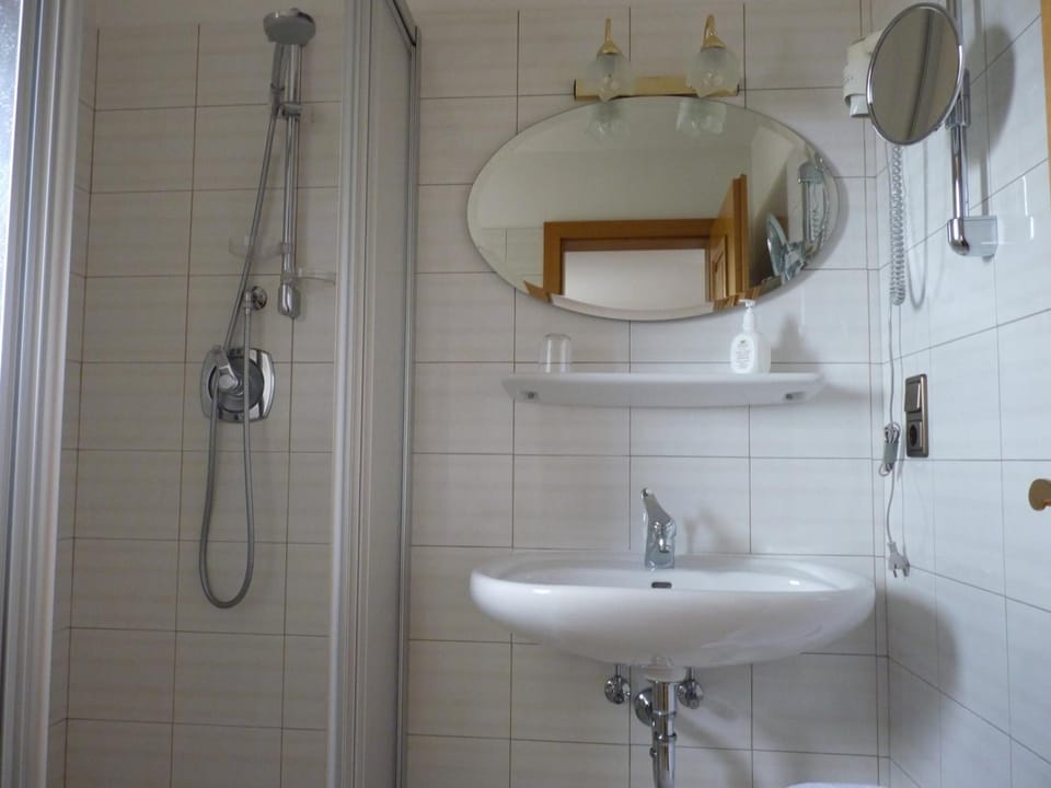 Hair dryer, slippers, towels