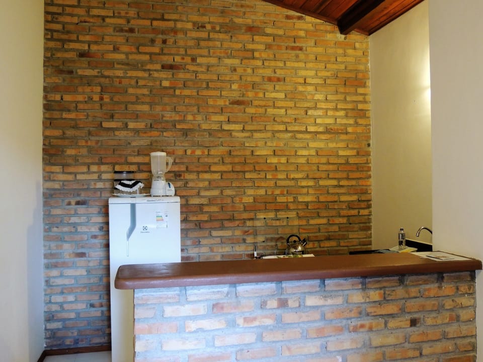 Family Townhome, 1 Bedroom | Private kitchenette | Fridge, microwave, oven, stovetop