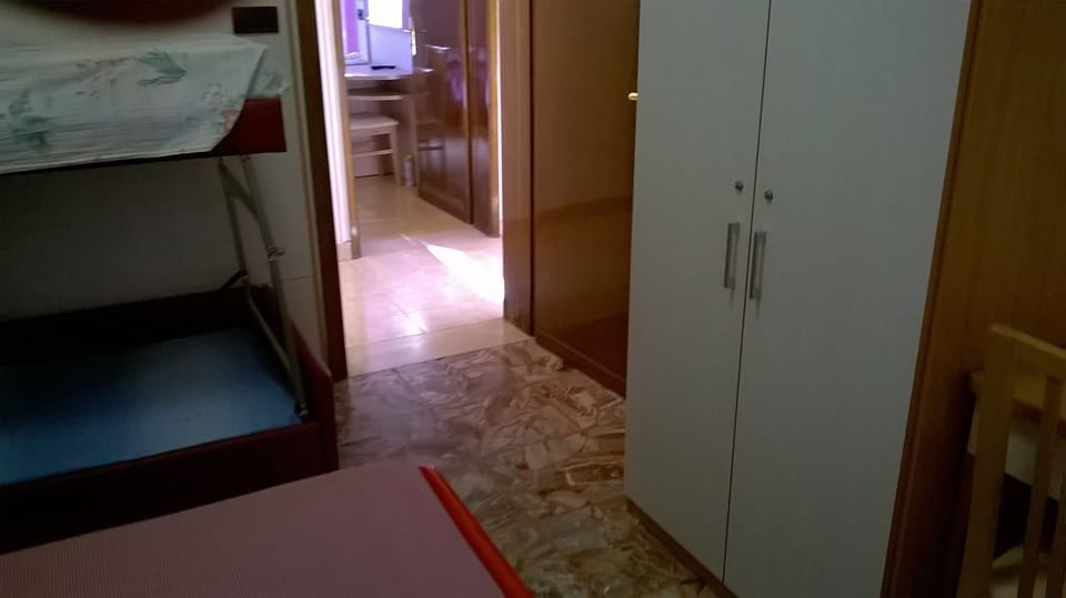Economy Quadruple Room, Shared Bathroom | In-room safe, soundproofing, cribs (surcharge), WiFi (surcharge)