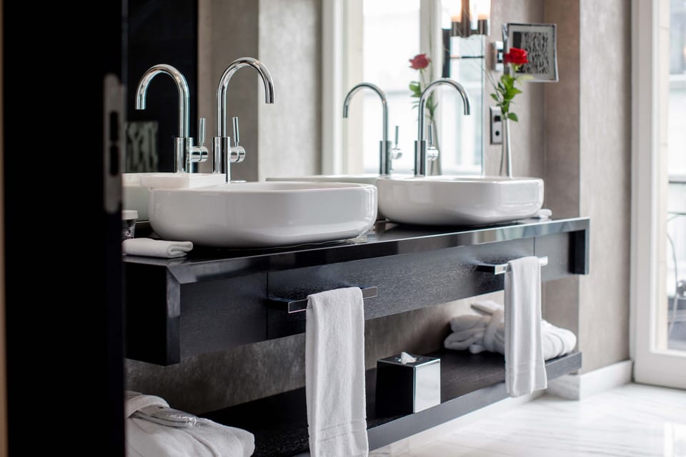 Rainfall showerhead, designer toiletries, hair dryer, bathrobes