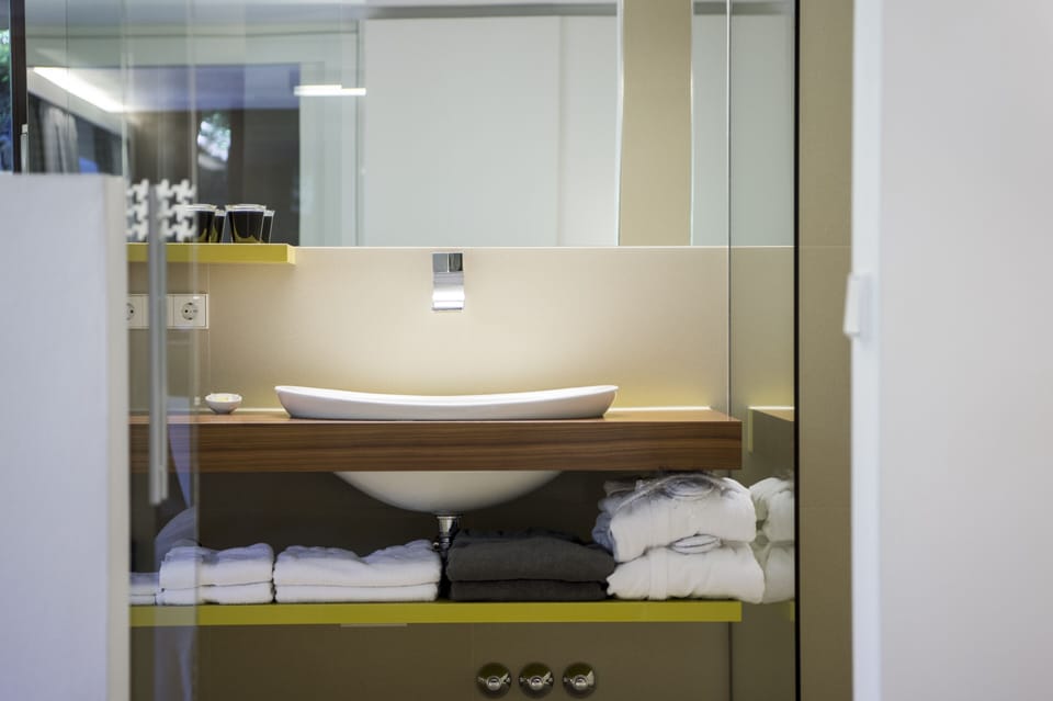 Comfort Studio Suite | Bathroom | Separate tub and shower, deep soaking tub, rainfall showerhead