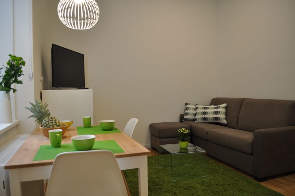Deluxe Apartment, 1 Bedroom | Living area | Flat-screen TV