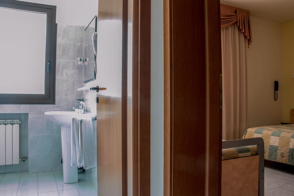 Standard Triple Room, 1 Bedroom | In-room safe, desk, laptop workspace, free WiFi