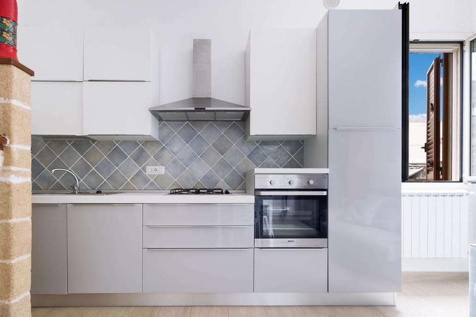 Comfort Apartment, 2 Bedrooms | Private kitchen | Full-size fridge, oven, stovetop, dishwasher