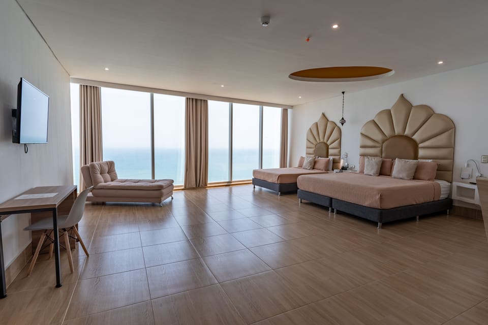 Junior Suite Ocean View | Premium bedding, minibar, in-room safe, desk
