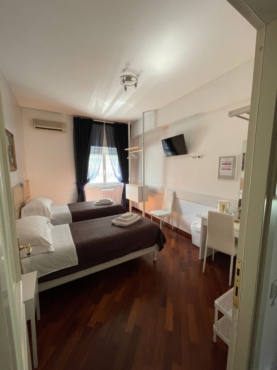 Economy Twin Beds | Desk, laptop workspace, free WiFi, bed sheets