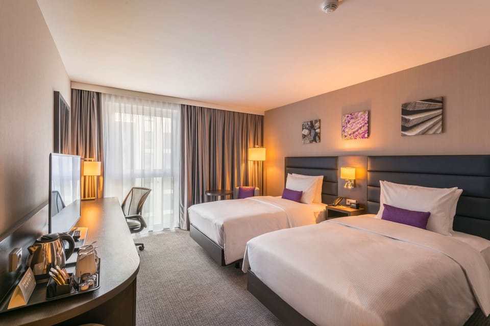 Twin Room, 2 Twin Beds | 1 bedroom, premium bedding, down comforters, in-room safe