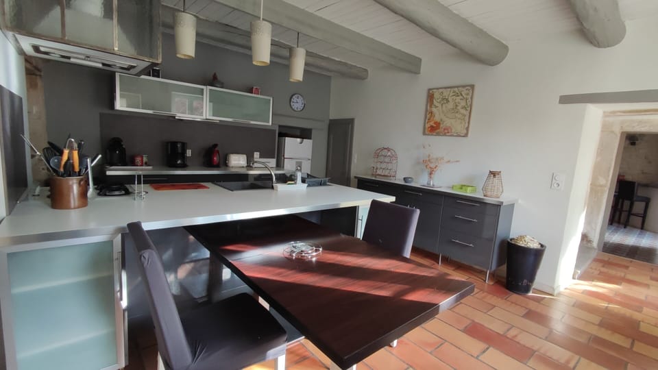 Comfort House, Private Bathroom, Courtyard View (Mas piscine ,boulodrome) | Private kitchen | Highchair